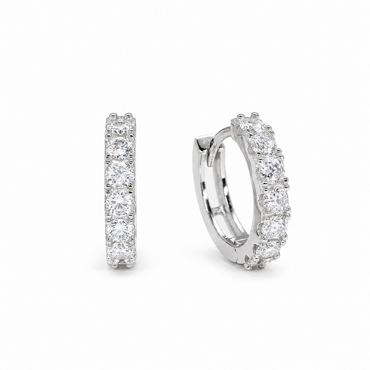Sévara Pavé Huggie Earrings in 925 Sterling Silver on pure white background