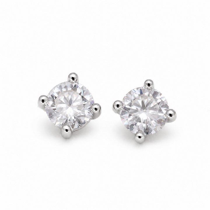 Maëra Solitaire Stud Earrings in 925 Sterling Silver on pure white background