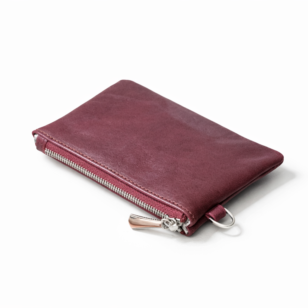 MOA burgundy leather mini pouch with zip closure and soft leather texture
