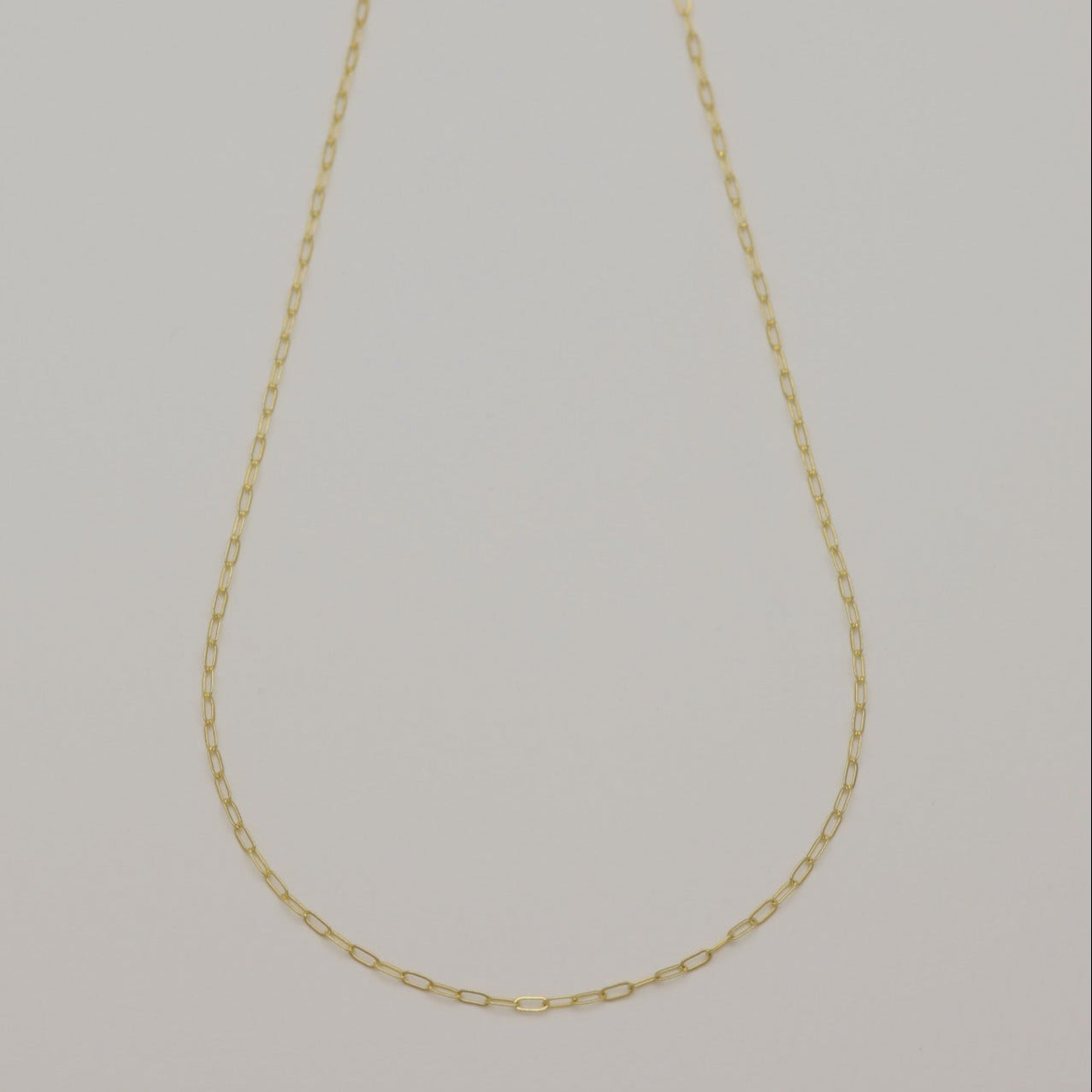 14K gold chain necklace displayed in full length on a neutral background.