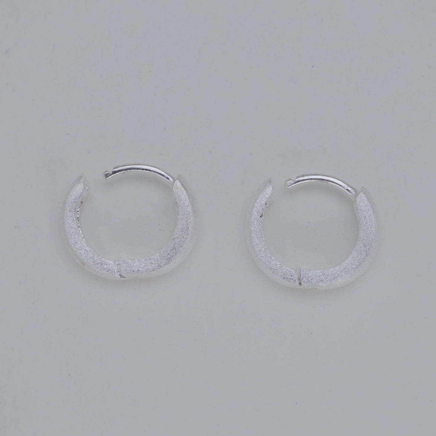 Cyrine Matte Huggie Earrings in 925 Sterling Silver by MOA - view 2