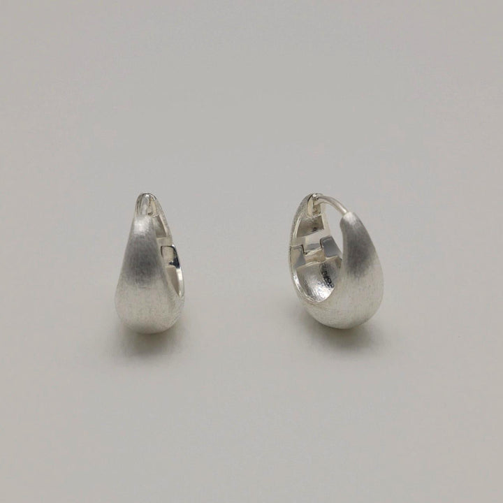 Edeline Matte Dome Huggie Earrings by MOA - view 1