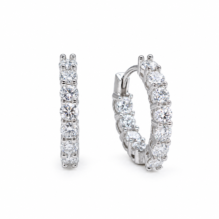 Iséne Huggie Earrings in 925 Sterling Silver - front and angled view