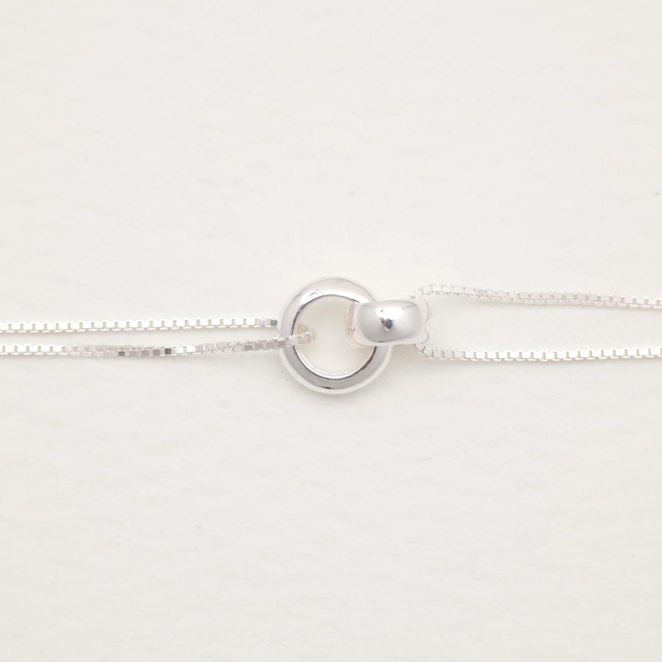 Close-up of the Liliane Double Chain Bracelet in Sterling Silver showing the interlocking polished rings.