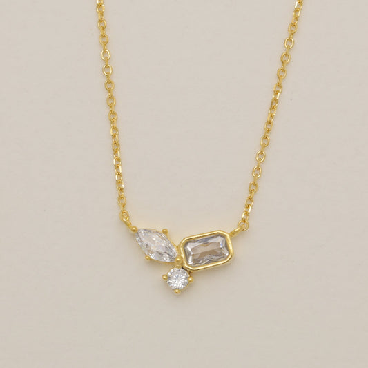 Gold vermeil necklace with trio cubic zirconia stones.