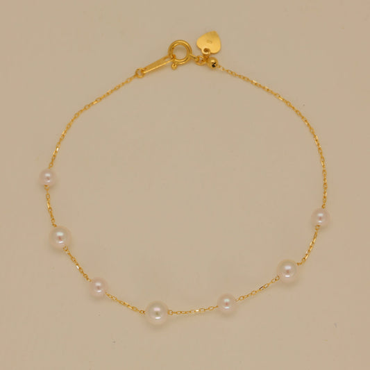 18k gold akoya pearl station bracelet with 3.5mm and 4.5mm pearls