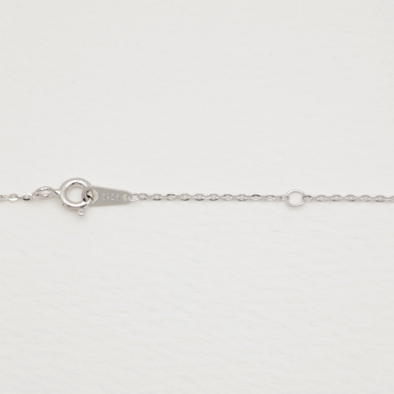 Clasp and extender detail of the sterling silver chain with 925 hallmark