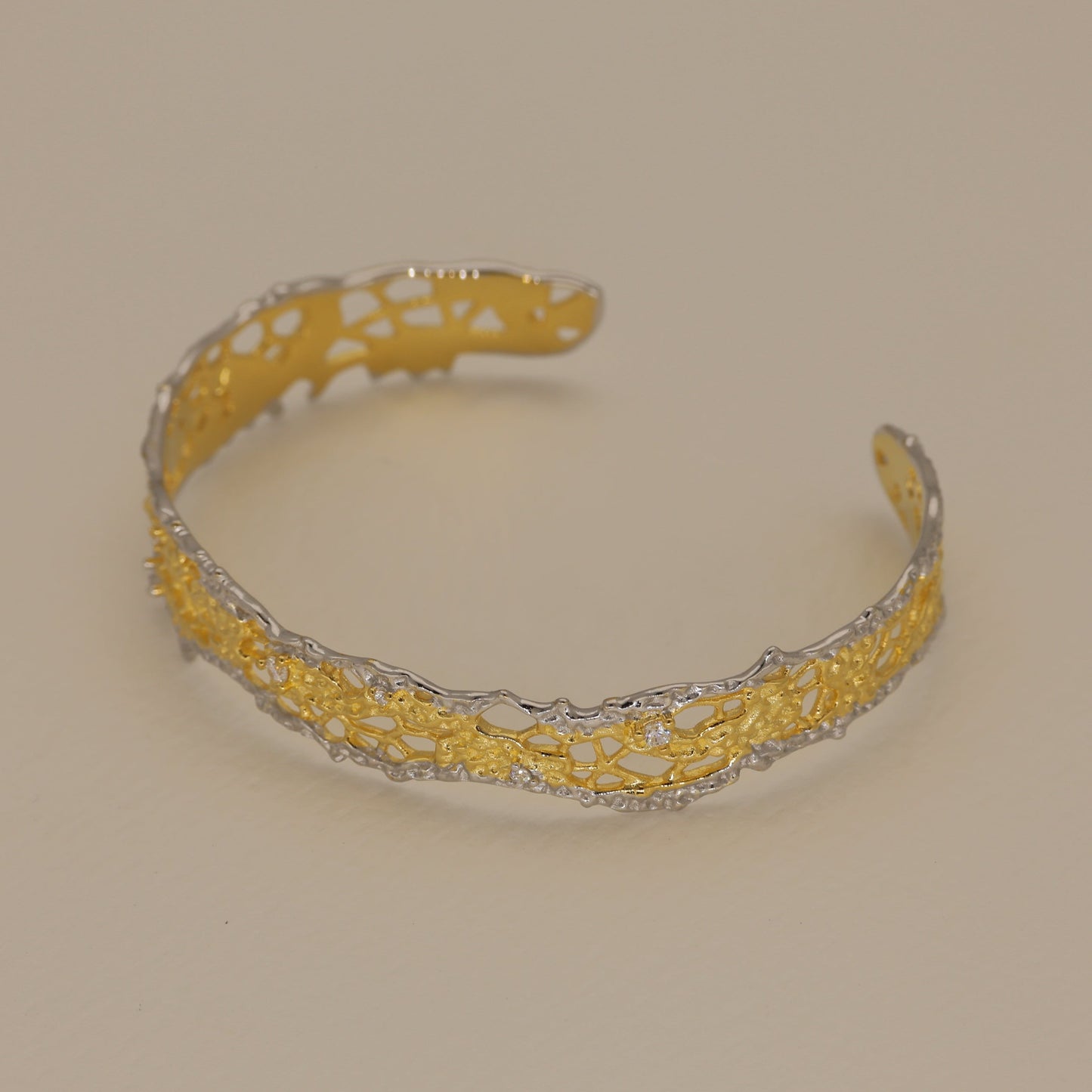two tone silver and gold filigree cuff bangle with cubic zirconia open design