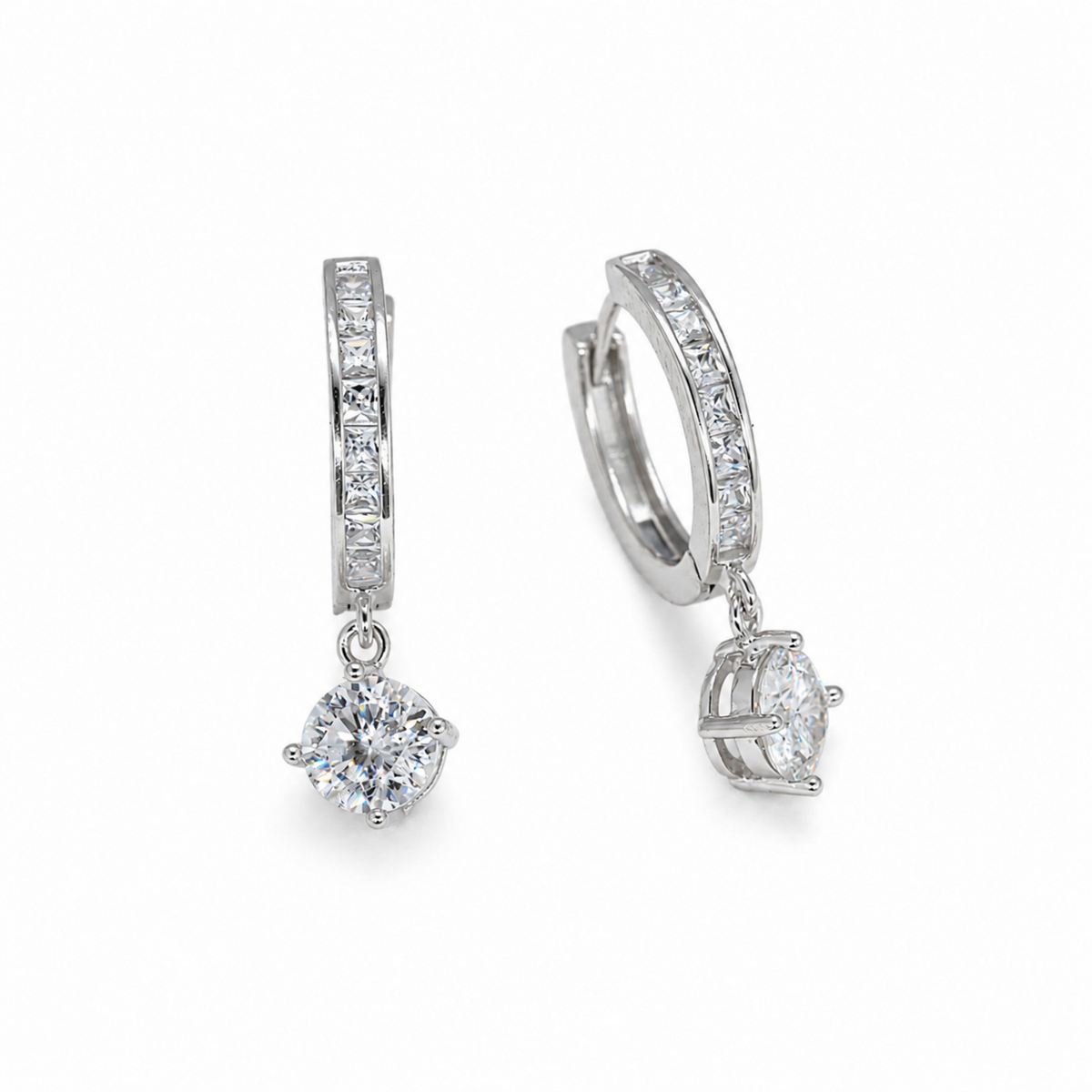 Élaris Drop Huggie Earrings in 925 Sterling Silver on pure white background
