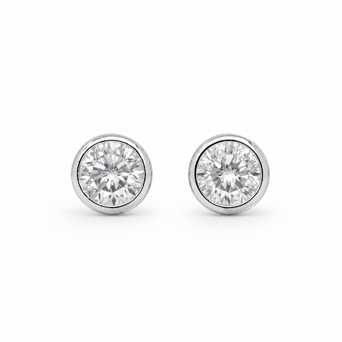 Éviane Bezel Stud Earrings in 925 Sterling Silver on pure white background