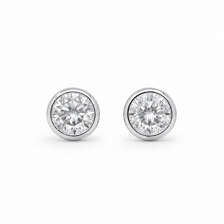 Éviane Bezel Stud Earrings in 925 Sterling Silver on pure white background