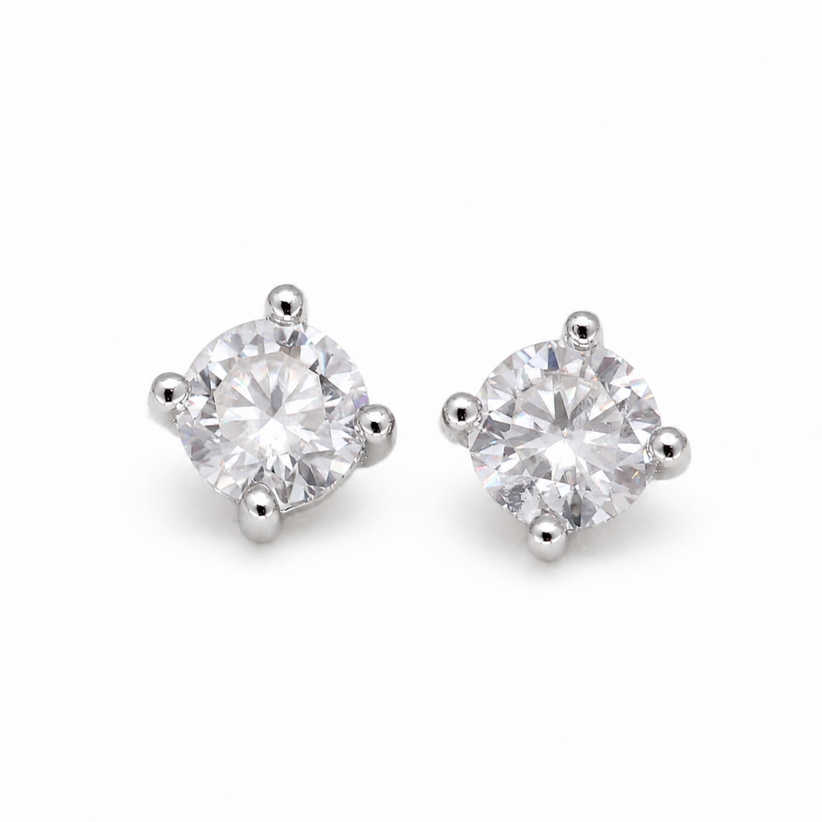 Maëra Solitaire Stud Earrings in 925 Sterling Silver on pure white background
