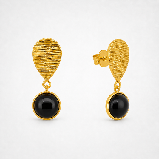 Minuit black onyx drop earrings in gold vermeil with ridged teardrop stud and round black onyx pendant, product shot on white background