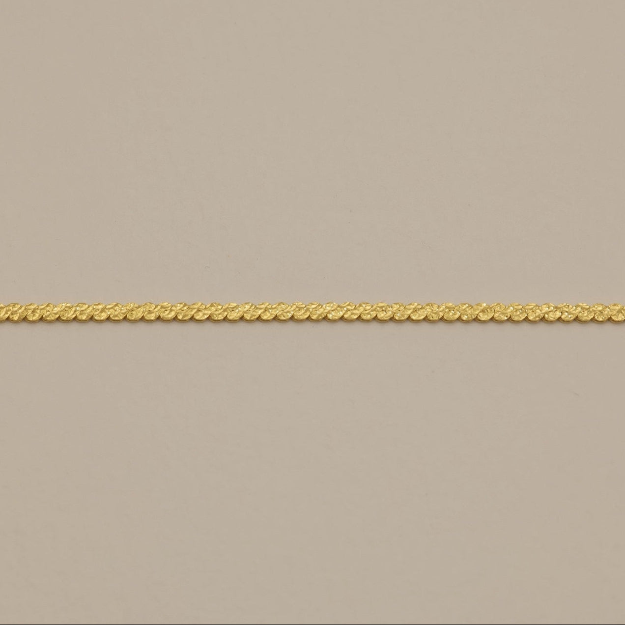 Overhead view highlighting chain texture and polished finish