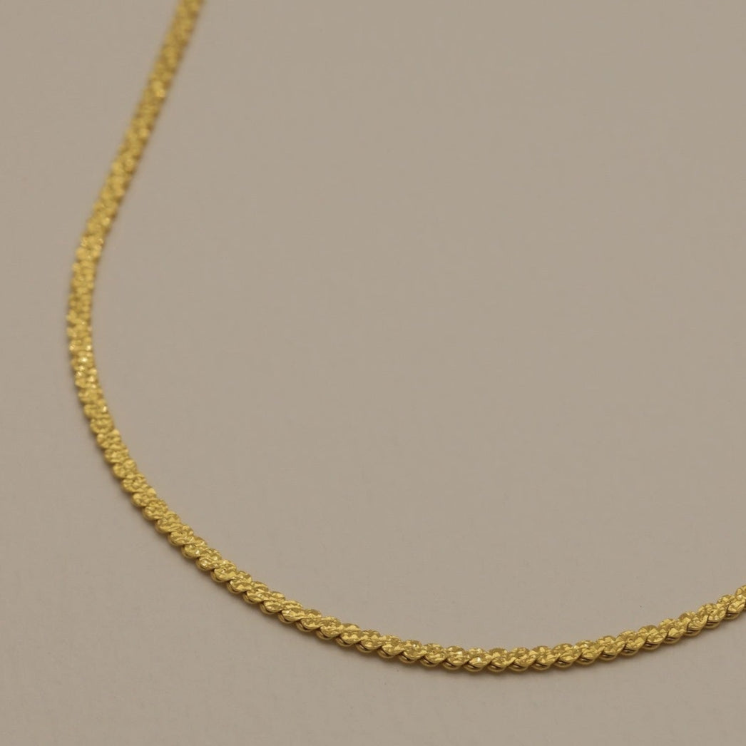 Overhead view highlighting chain texture and polished finish