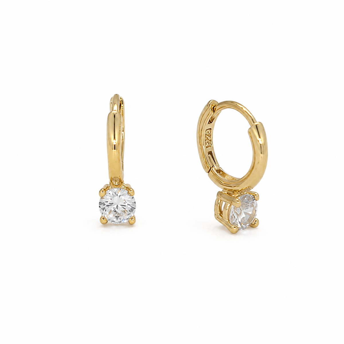 Coralie solitaire CZ drop huggie earrings in 18K gold vermeil angled view