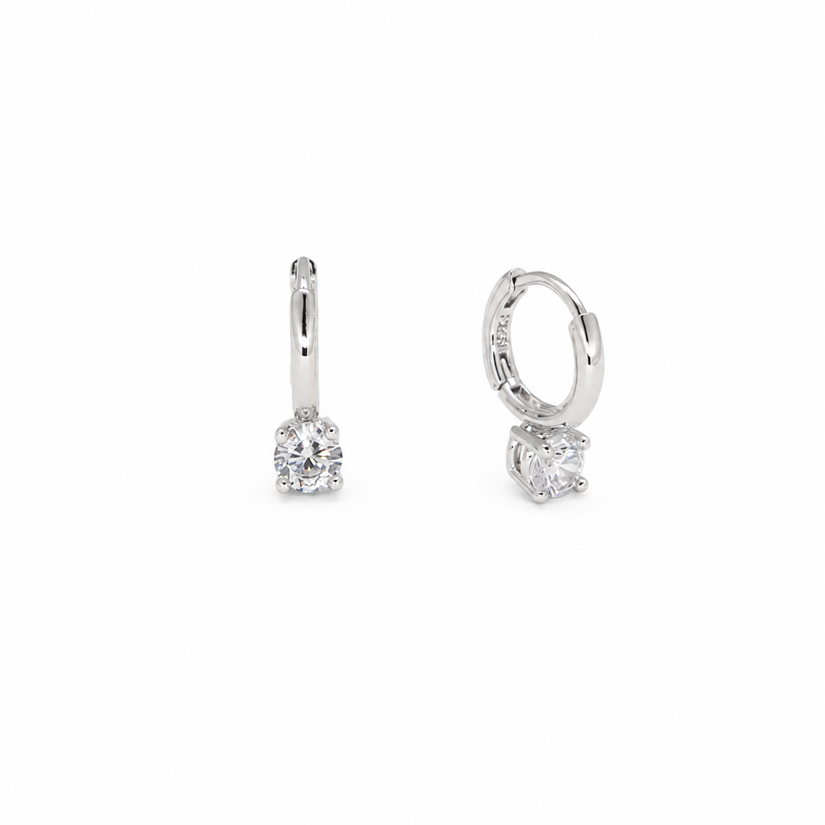 Coralie solitaire CZ drop huggie earrings in 925 sterling silver angled view