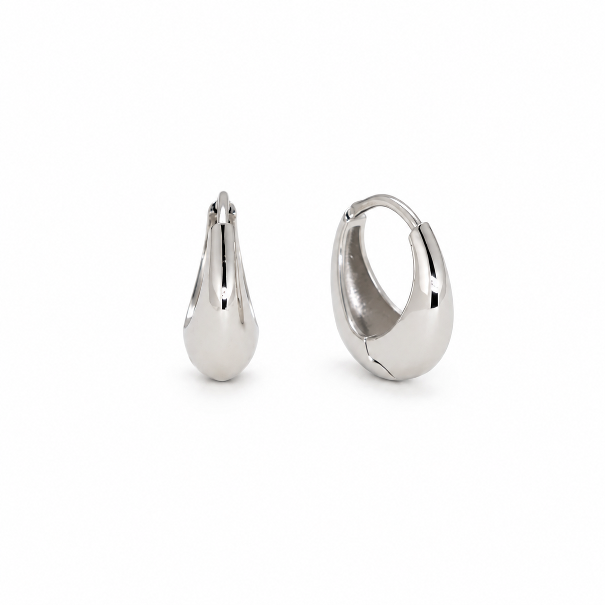 Élise sculptural tapered hoop earrings in 925 sterling silver angled view