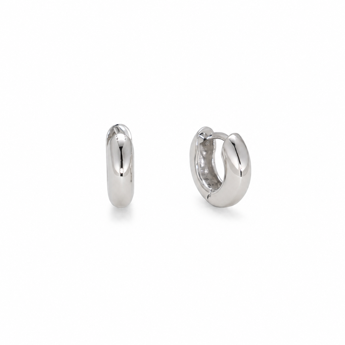 Noémie dome huggie earrings in 925 sterling silver angled view