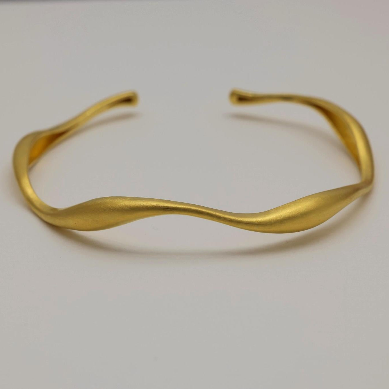 Halo Bracelet top-down view showing full open cuff shape and satin matte finish