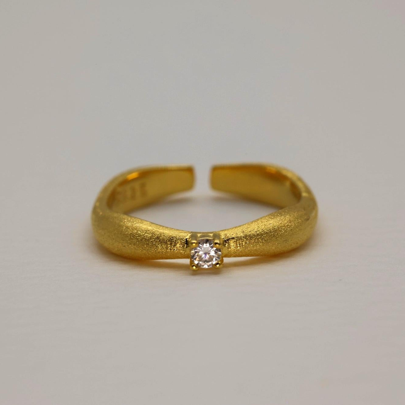 Matte gold vermeil ring with cubic zirconia front view