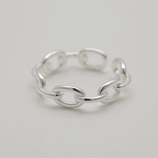 Adjustable chain link ring in polished 925 sterling silver, displayed on white background
