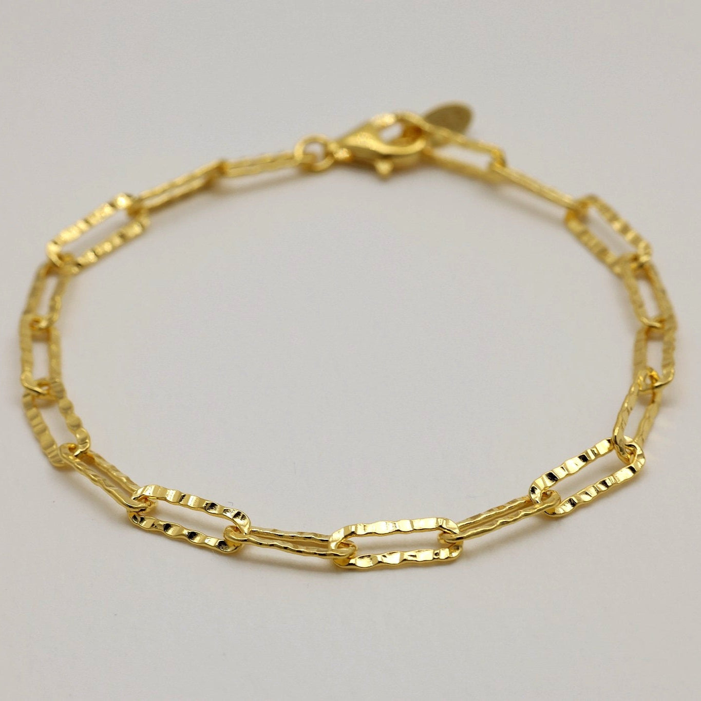 Gold vermeil bracelet with textured rectangular links and lobster clasp


