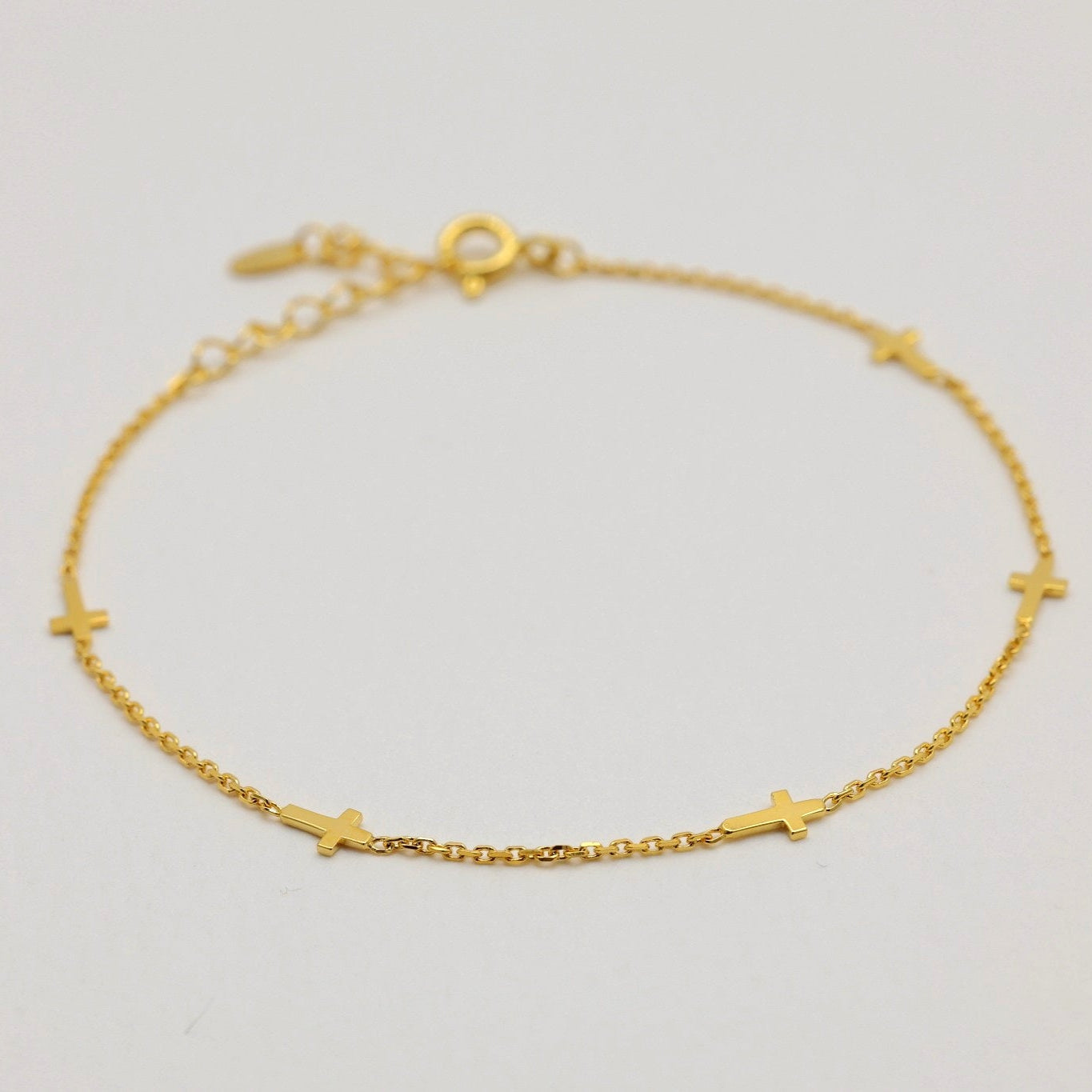 Gaëlle bracelet in gold vermeil shown in a looped circle with clasp and extender

