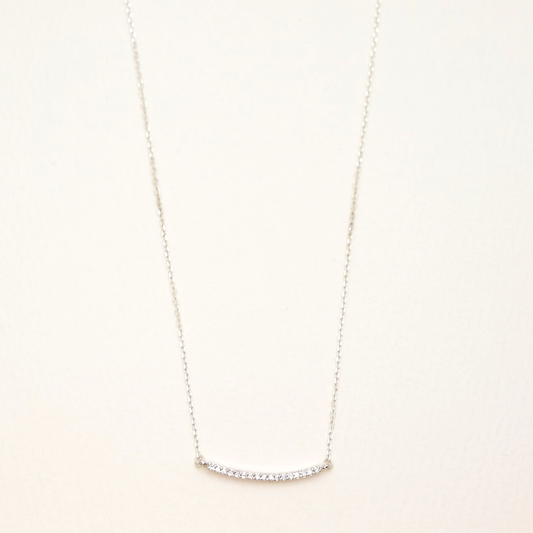 925 sterling silver curved bar necklace with cubic zirconia pavé setting on white background
