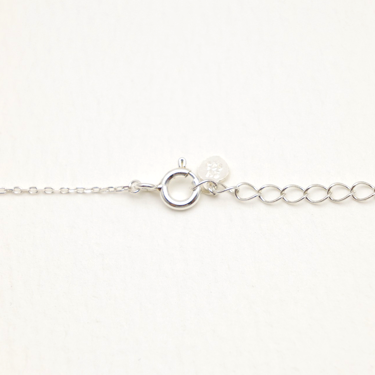 Clasp and extender detail of 925 sterling silver necklace with MOA tag