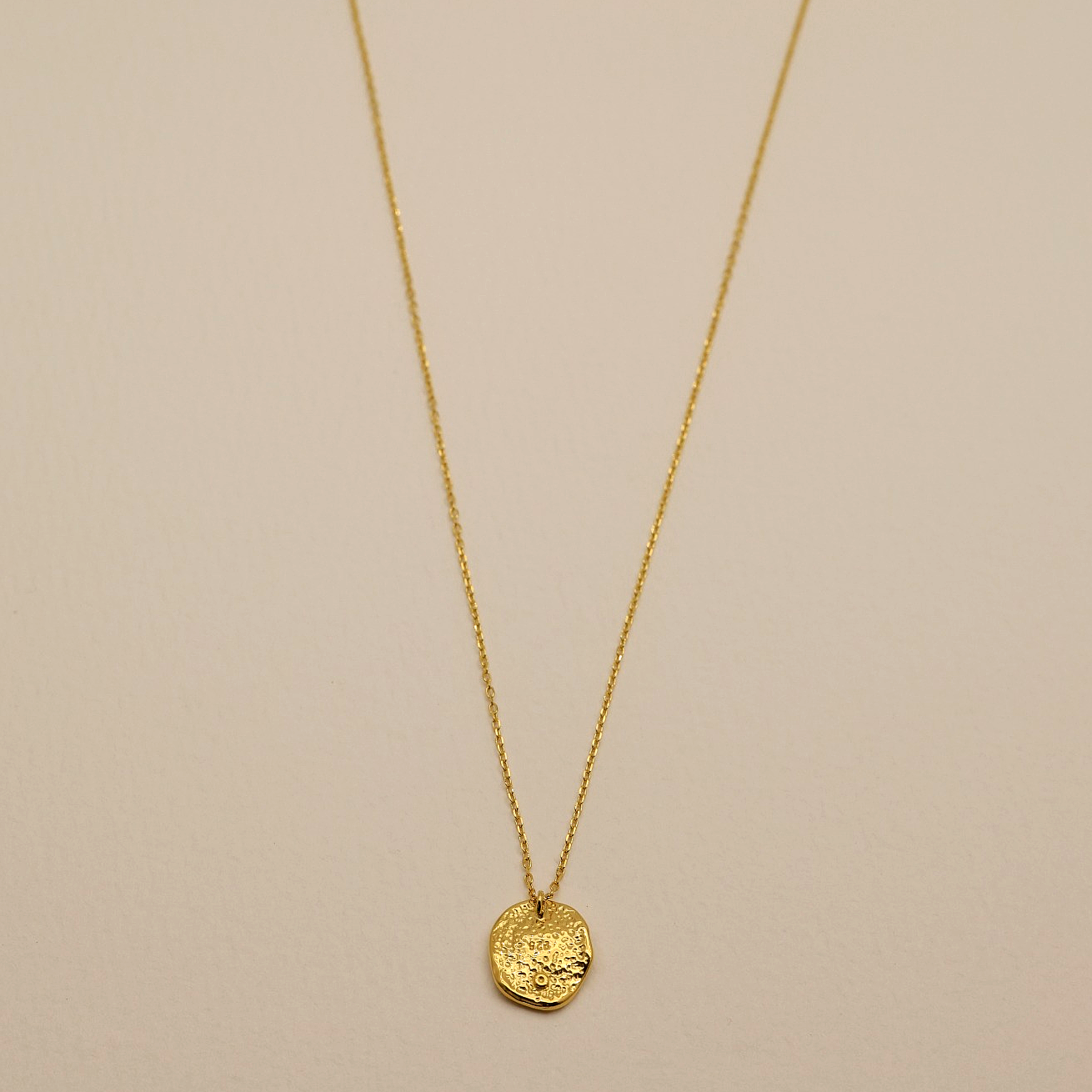 Korean-made gold vermeil necklace with reflective pendant