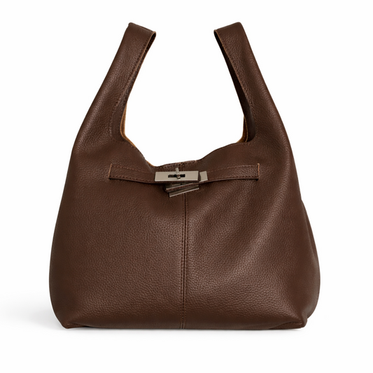 MOA ebony leather hobo bag with soft structure and metal clasp detail on a clean background