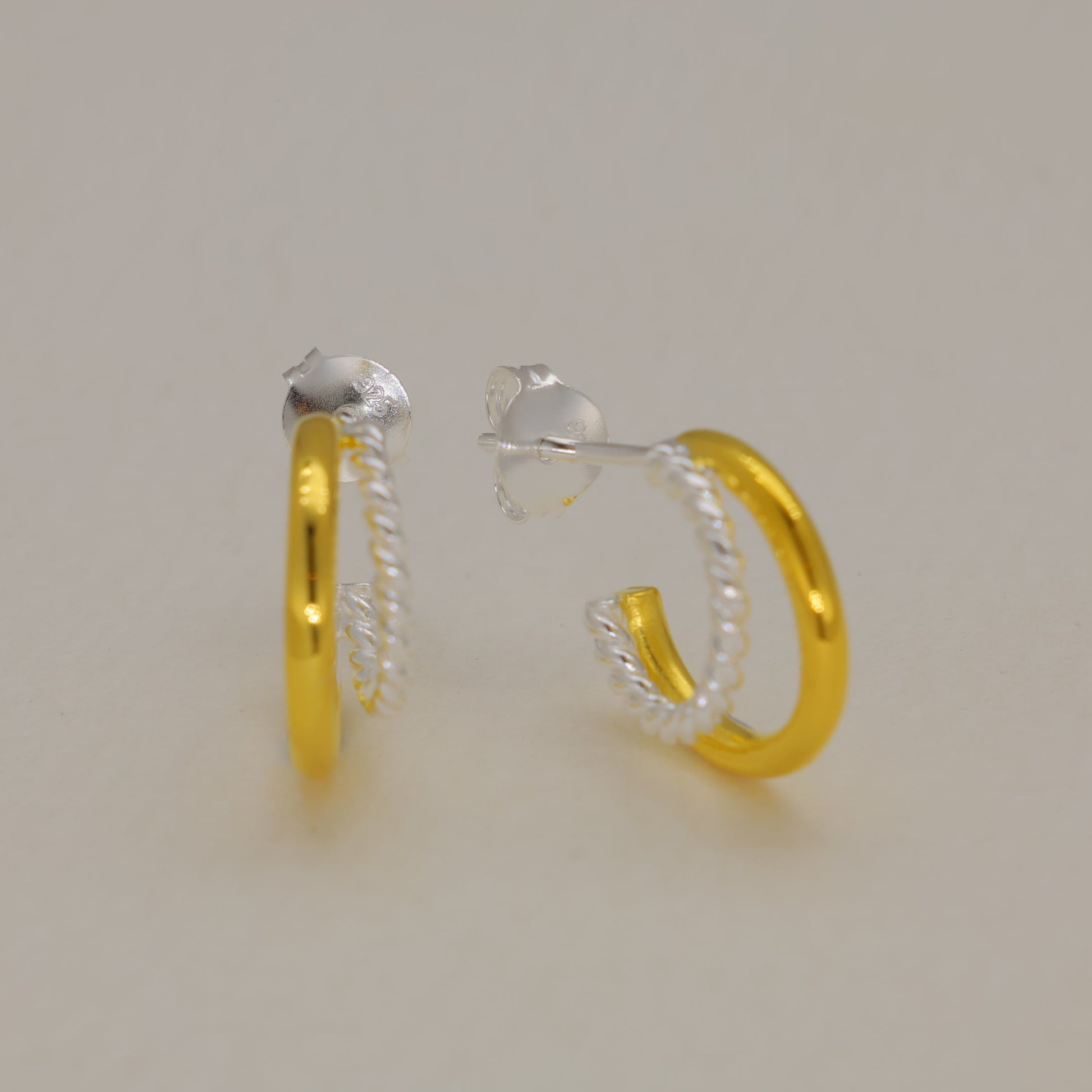 Caliste Two-Tone Twist Hoop Earrings in 18K Gold over 925 Silver by MOA - view 1