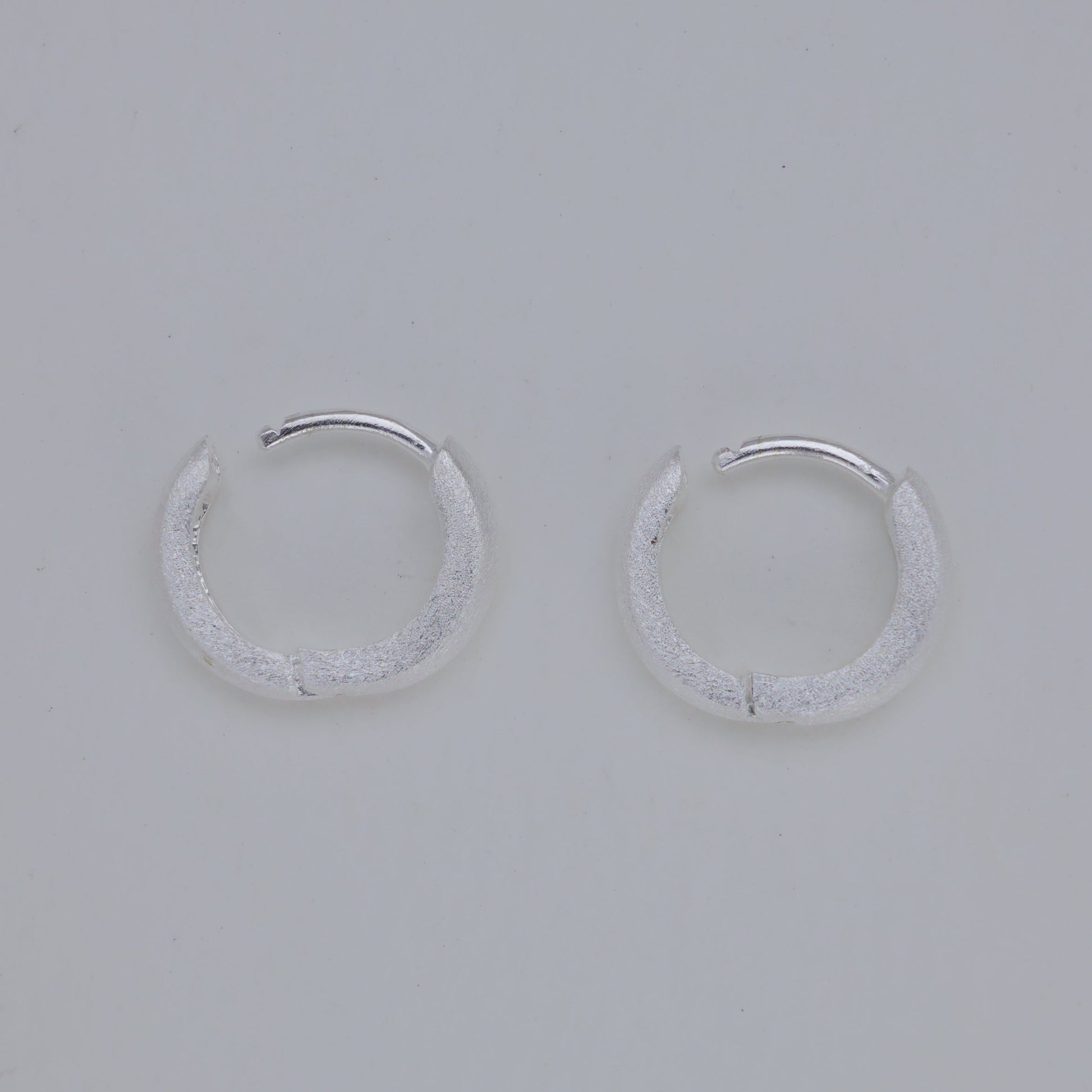 Cyrine Matte Huggie Earrings in 925 Sterling Silver by MOA - view 2
