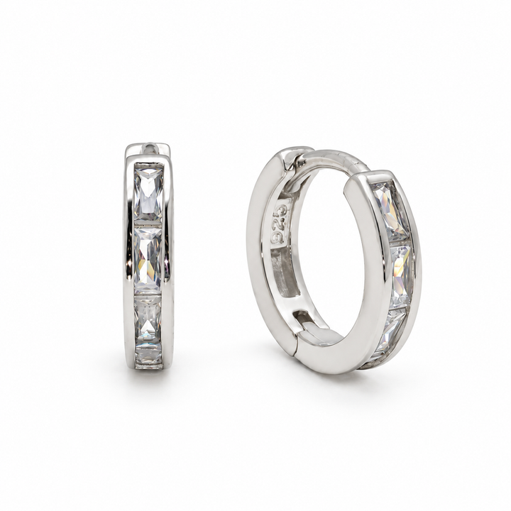 Inez Channel Huggie Earrings in 925 sterling silver, one pair on white background