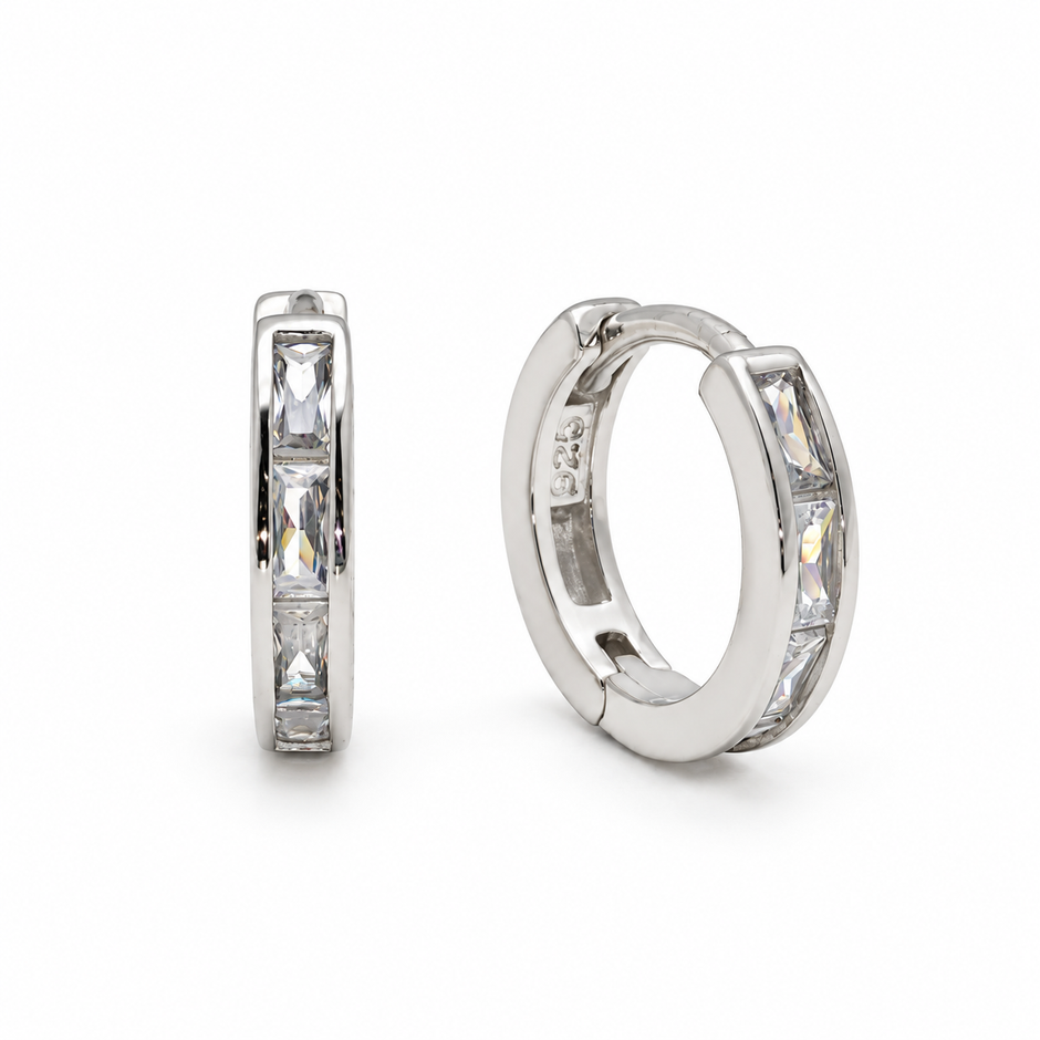 Inez Channel Huggie Earrings in 925 sterling silver, one pair on white background