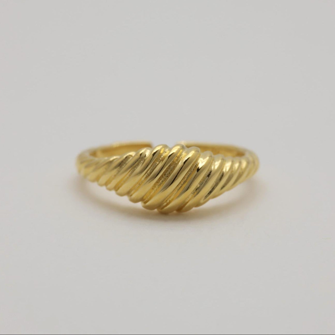 Front-facing view of the Odile Ring emphasizing the bold, curved design.

