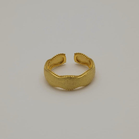 Gold vermeil wavy ring with beaded edges, front view on neutral background.