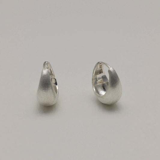 Sterling silver mini hoops with soft brushed finish