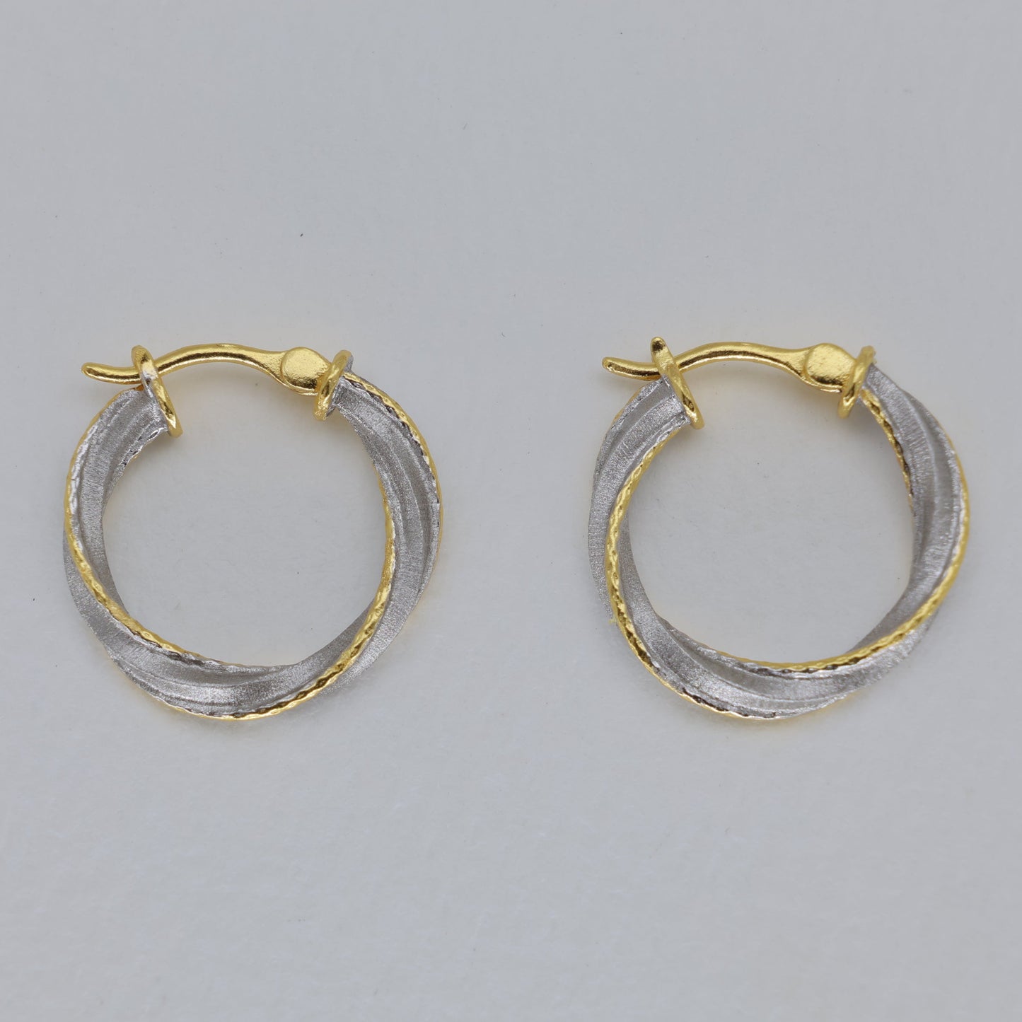 Evora Twist Hoop Earrings in Two-Tone 24K Gold Over 925 Silver by MOA - view 1