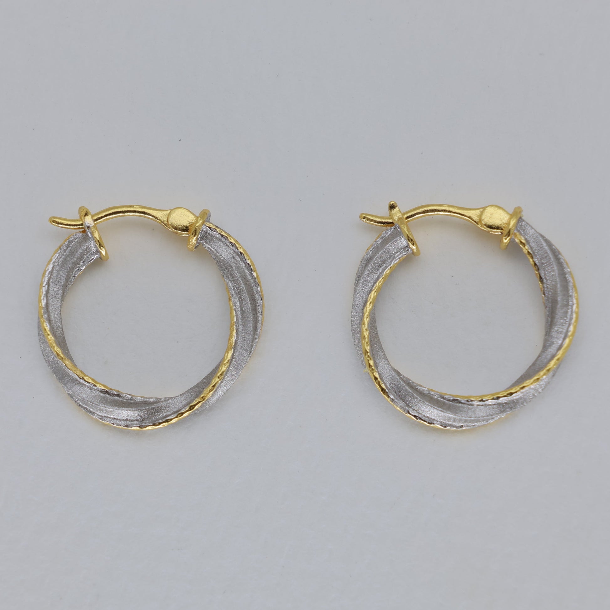 Evora Twist Hoop Earrings in Two-Tone 24K Gold Over 925 Silver by MOA - view 1