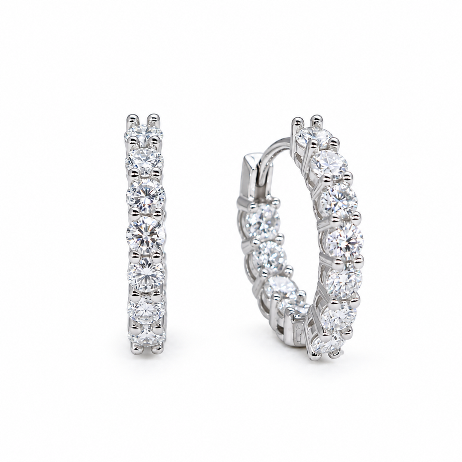 Iséne Huggie Earrings in 925 Sterling Silver - front and angled view