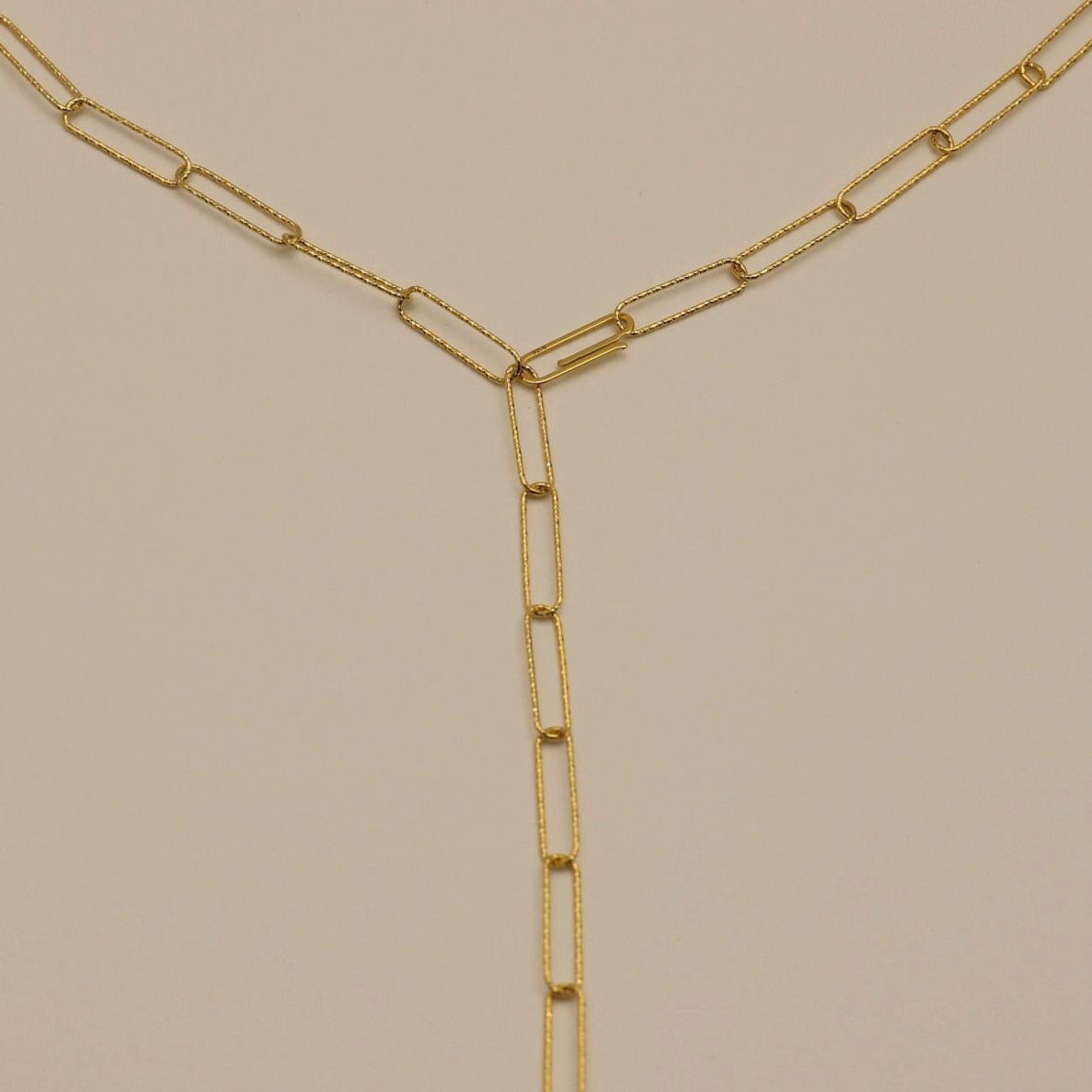 Versatile Y-drop styling of the gold vermeil chain necklace with geometric links.