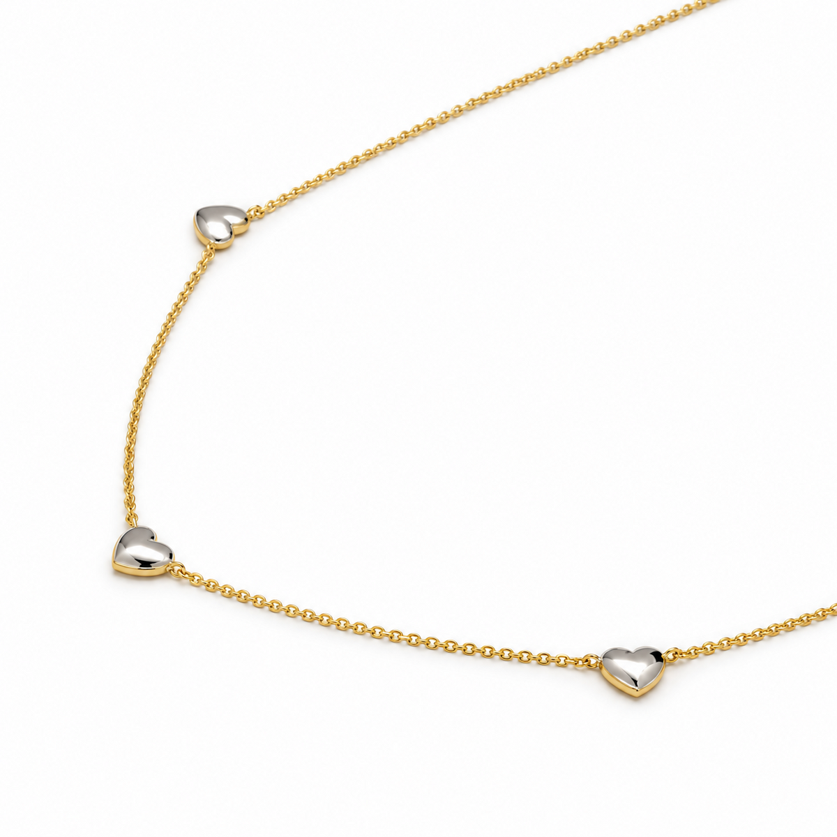 Mireille Two Tone Heart Station Necklace detail view
