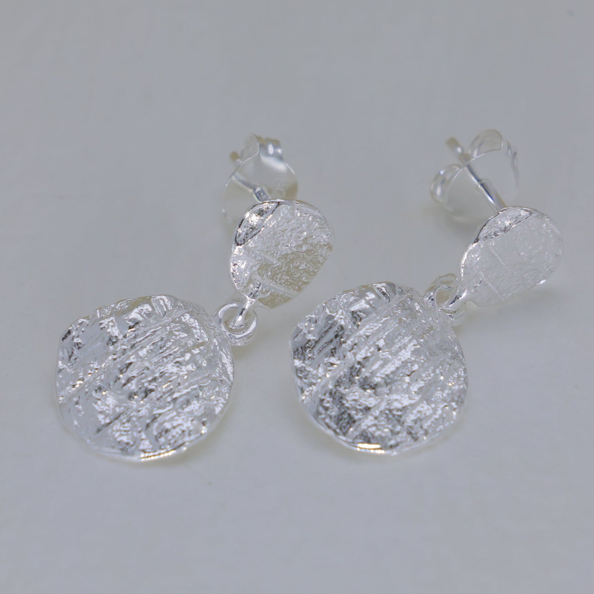 Orelie Textured Drop Earrings in 925 Sterling Silver by MOA - view 1