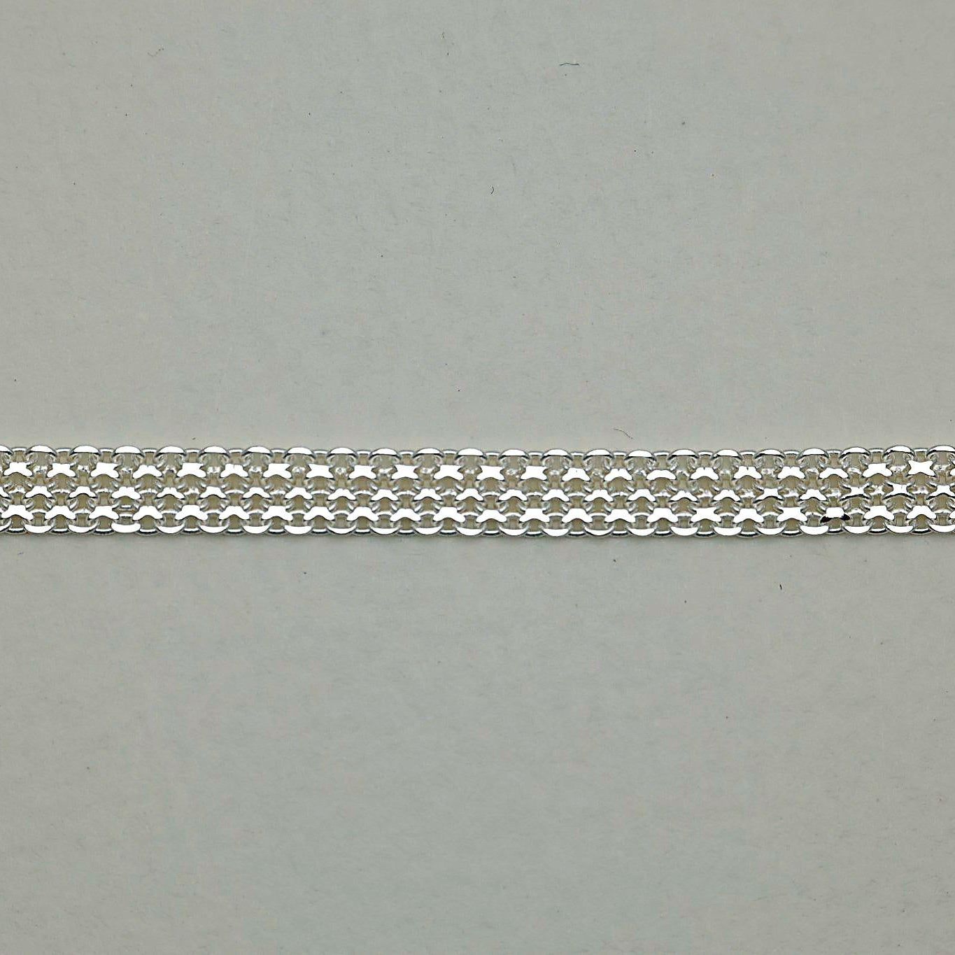 Silver heart tag and end links of the Marcelline Bracelet