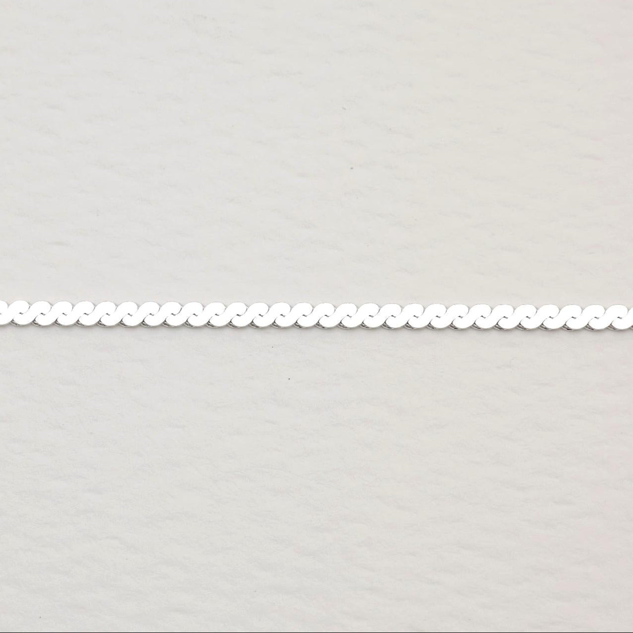 Clasp detail showing 925 silver tag and spring clasp.


