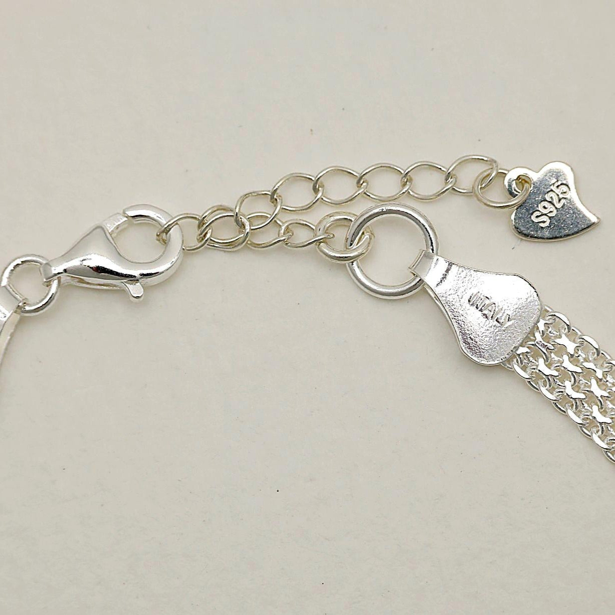 Lobster clasp and extender of the Marcelline Woven Bracelet in sterling silver
