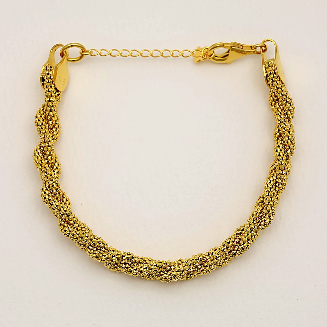 Full bracelet view of Béatrice Twist Bracelet with lobster clasp and extender.