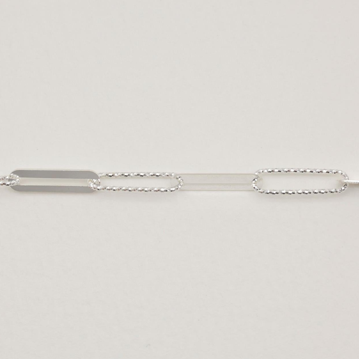 Close-up of dual-texture silver chain links